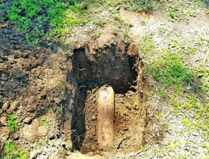 Hole exposed underground plumbing